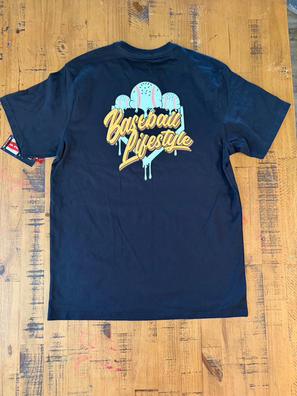Men's Black Short-Sleeve Graphic Tee with Drip Crest